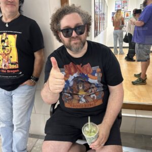 Local artist Greg Steele and Rob Floyd at the opening of the NARO A Poster Art Extravaganza