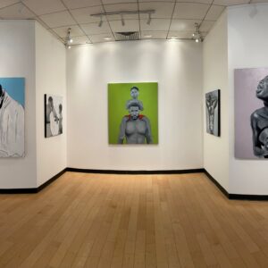 Oil paintings hanging in the Offsite Gallery by local artist Ray Johnson